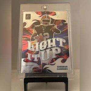 SHEDEUR SANDERS 2025 PANINI DONRUSS OPTIC PRIZM FOOTBALL ROOKIE CARD-LIGHT IT UP